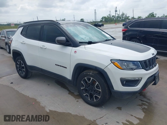 2020 Jeep Compass Trailhawk with VIN 3C4NJDDB3LT118928, listed as a IAAI auction lot 42128120 with 95,477 mi miles and . Bid and sale history available at DreamBid. Image 1.