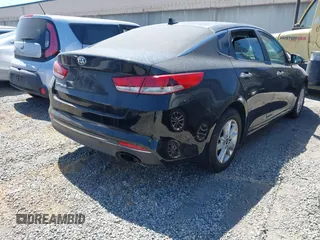 2017 Kia Optima LX z VIN KNAGT4L33H5156094, wystawiony jako IAAI lot #42405505 z przebiegiem 111 622 mil mil oraz . Historia ofert i sprzedaży dostępna na DreamBid. Obrazek 4.