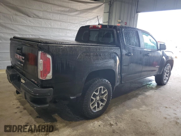 2021 GMC Canyon 4WD AT4 w/Leather with VIN 1GTG6FEN8M1255144, listed as a Copart auction lot 50186815 with 43,610 mi miles and Salvage Title. Bid and sale history available at carsss.com. Image 3.