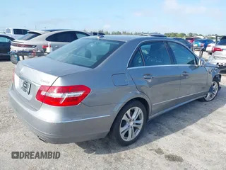 2011 Mercedes-Benz E-Class E 350 Luxury with VIN WDDHF8HB1BA485662, listed as a IAAI auction lot 41978098 with 28,765 mi miles. Bid and sale history available at carsss.com. Image 4.