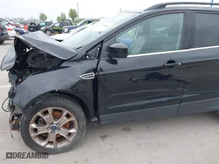 2016 Ford Escape SE with VIN 1FMCU9GX9GUA62830, listed as a IAAI auction lot 42014409 with 1 mi miles. Bid and sale history available at carsss.com. Image 17.