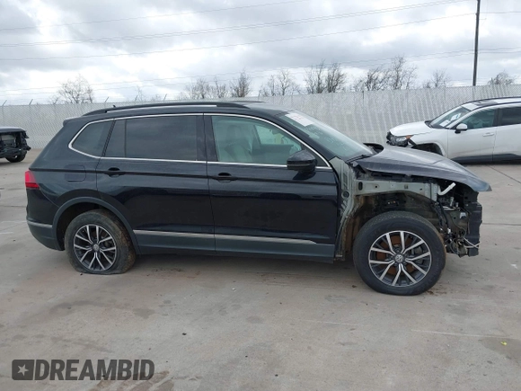2020 Volkswagen Tiguan SE with VIN 3VV3B7AX7LM067046, listed as a IAAI auction lot 41697405 with 53,573 mi miles and . Bid and sale history available at DreamBid. Image 13.
