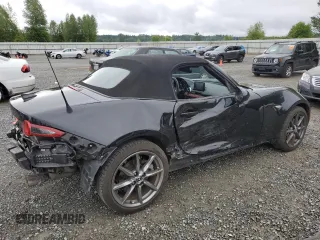 2021 Mazda MX-5 Miata Grand Touring with VIN JM1NDAD78M0455899, listed as a Copart auction lot 57347125 with 38,405 mi miles and Salvage title. Bid and sale history available at DreamBid. Image 3.