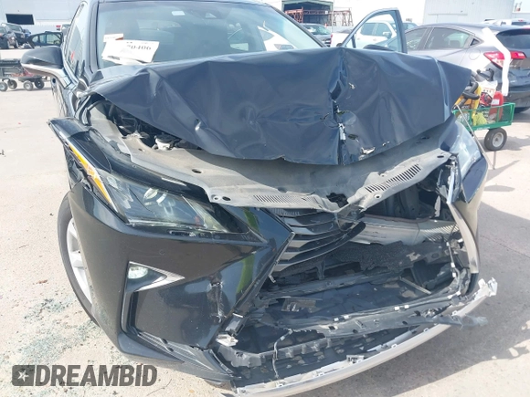 2016 Lexus RX 350 z VIN 2T2BZMCA4GC047800, wystawiony jako IAAI lot #42270406 z przebiegiem 112 181 mil mil oraz . Historia ofert i sprzedaży dostępna na DreamBid. Obrazek 6.