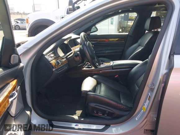 2015 BMW 7 Series 750Li with VIN WBAYE8C5XFD782039, listed as a IAAI auction lot 41505626 with 74,716 mi miles. Bid and sale history available at carsss.com. Image 5.