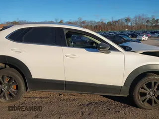 2021 Mazda CX-30 Premium with VIN 3MVDMBDY2MM236118, listed as a IAAI auction lot 41182309 with 32,286 mi miles and . Bid and sale history available at carsss.com. Image 12.