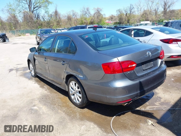 2011 Volkswagen Jetta Sedan SE PZEV with VIN 3VWDZ7AJ0BM306023, listed as a IAAI auction lot 42059241 with 176,879 mi miles. Bid and sale history available at carsss.com. Image 3.