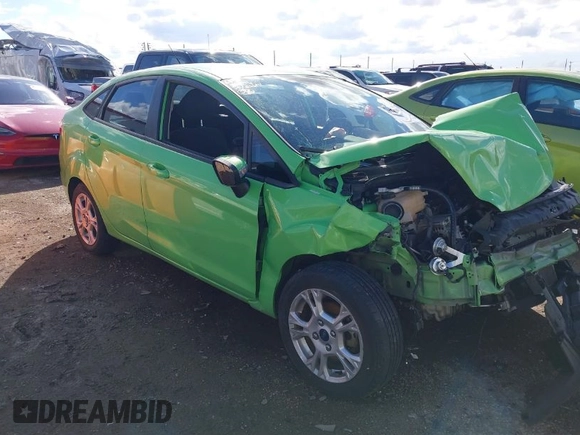 2014 Ford Fiesta SE with VIN 3FADP4BJ2EM203010, listed as a IAAI auction lot 40763881 with 60,803 mi miles. Bid and sale history available at carsss.com. Image 1.