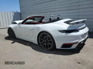 2021 Porsche 911 Turbo S with VIN WP0CD2A96MS263310, listed as a Copart auction lot 65493254 with 4,904 mi miles and Salvage Title. Bid and sale history available at carsss.com. Image 2.