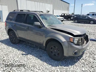 2010 Ford Escape XLT с VIN 1FMCU0D77AKA50940, выставлен на аукционе Copart как лот 55066975 с пробегом 169 940 миль миль и Списание • Salvage title. История ставок и продаж доступна на DreamBid. Изображение 4.