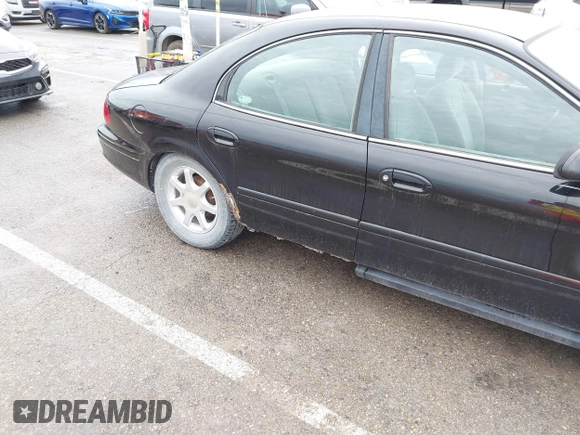 2003 Mercury Sable GS with VIN 1MEFM50203A615030, listed as a IAAI auction lot 41841794 with 226,844 mi miles and . Bid and sale history available at DreamBid. Image 12.