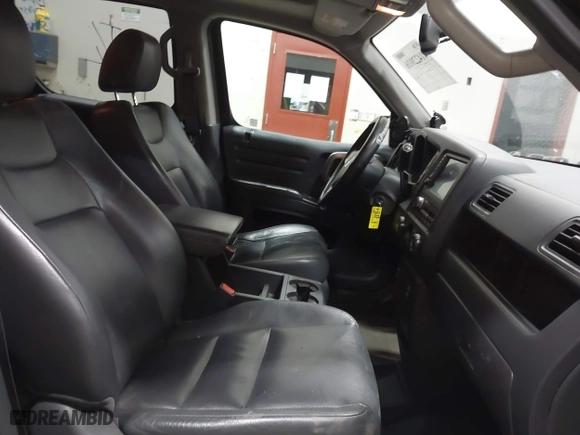 2014 Honda Ridgeline SE with VIN 5FPYK1F63EB013811, listed as a IAAI auction lot 41422016 with 168,653 mi miles. Bid and sale history available at carsss.com. Image 5.