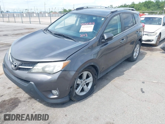 2013 Toyota RAV4 XLE with VIN 2T3WFREV0DW051372, listed as a IAAI auction lot 42310212 with 206,471 mi miles and . Bid and sale history available at DreamBid. Image 18.