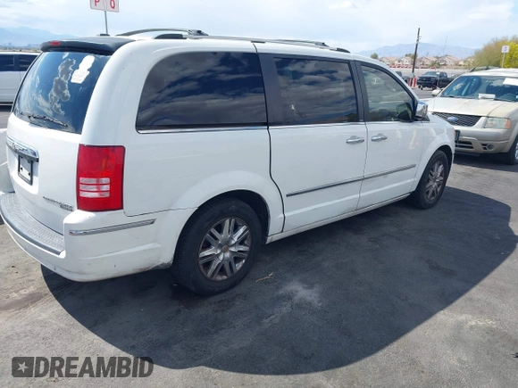 2010 Chrysler Town & Country Limited with VIN 2A4RR7DX1AR357668, listed as a IAAI auction lot 42173545 with 114,486 mi miles and . Bid and sale history available at carsss.com. Image 4.