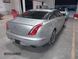 2015 Jaguar XJ with VIN SAJWA1CZ8F8V83873, listed as a IAAI auction lot 41271111 with 94,830 mi miles. Bid and sale history available at carsss.com. Image 4.