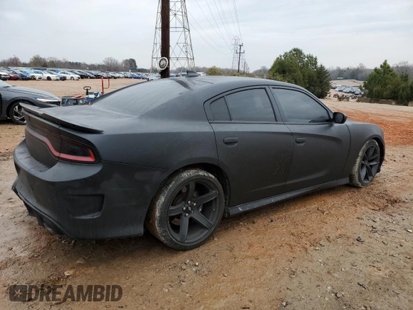 2019 Dodge Charger Scat Pack with VIN 2C3CDXGJ8KH638590, listed as a Copart auction lot 84241704 with 104,354 mi miles and Salvage Title. Bid and sale history available at DreamBid. Image 3.