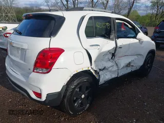 2020 Chevrolet Trax LT with VIN KL7CJLSB0LB083963, listed as a IAAI auction lot 42073793 with 62,925 mi miles and . Bid and sale history available at DreamBid. Image 4.