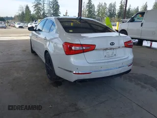 2014 Kia Cadenza Premium with VIN KNALN4D74E5138497, listed as a IAAI auction lot 41678439 with 155,194 mi miles. Bid and sale history available at carsss.com. Image 3.