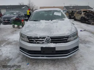 2015 Volkswagen Jetta Sedan 2.0L S with VIN 3VW2K7AJ7FM266914, listed as a IAAI auction lot 41270331 with 72,800 mi miles. Bid and sale history available at carsss.com. Image 12.