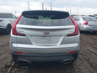 2022 Cadillac XT4 AWD Premium Luxury with VIN 1GYFZDR43NF152561, listed as a IAAI auction lot 41669571 with 16,274 mi miles and . Bid and sale history available at carsss.com. Image 16.