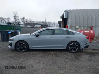 2024 Kia K5 GT-Line z VIN 5XXG64J22RG228095, wystawiony jako IAAI lot #41888510 z przebiegiem 11 927 mil mil oraz . Historia ofert i sprzedaży dostępna na DreamBid. Obrazek 15.