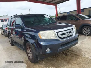 2011 Honda Pilot Touring z VIN 5FNYF3H94BB032105, wystawiony jako IAAI lot #42435522 z przebiegiem 247 899 mil mil oraz . Historia ofert i sprzedaży dostępna na DreamBid. Obrazek 1.