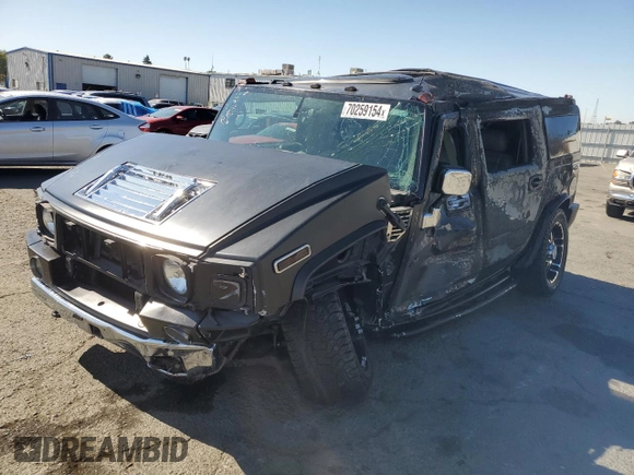 2003 Hummer H2 with VIN 5GRGN23U83H134284, listed as a Copart auction lot 70259154 with 0 mi miles and Salvage Title. Bid and sale history available at carsss.com. Image 1.