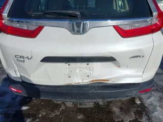 2018 Honda CR-V LX with VIN 2HKRW6H37JH208260, listed as a IAAI auction lot 41498130 with 156,966 mi miles. Bid and sale history available at carsss.com. Image 6.