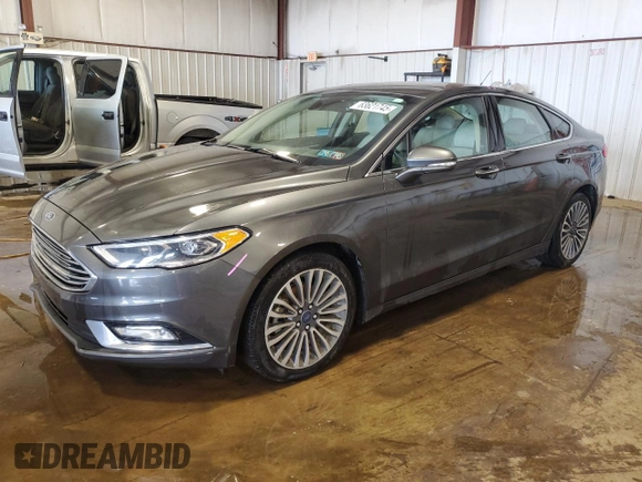 2017 Ford Fusion Titanium z VIN 3FA6P0D93HR303905, wystawiony jako Copart lot #63621745 z przebiegiem 120 249 mil mil oraz Szkoda całkowita • Salvage title. Historia ofert i sprzedaży dostępna na DreamBid. Obrazek 1.