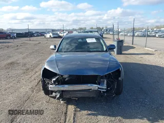 2014 Audi allroad A4 Premium Plus z VIN WA1UFAFL8EA133365, wystawiony jako IAAI lot #42034903 z przebiegiem 145 285 mil mil oraz . Historia ofert i sprzedaży dostępna na DreamBid. Obrazek 13.