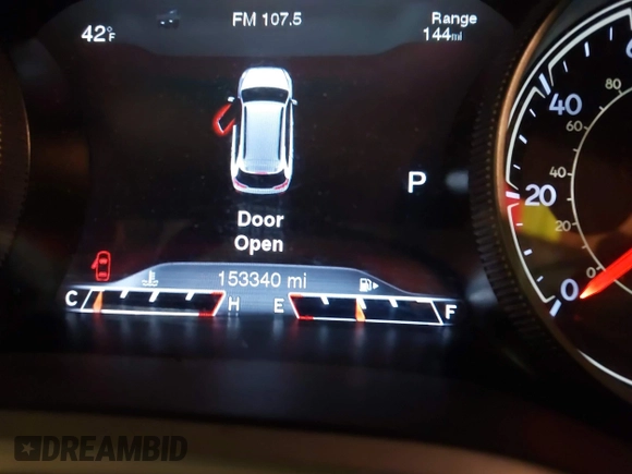 2015 Jeep Cherokee Trailhawk with VIN 1C4PJMBS6FW724931, listed as a IAAI auction lot 41602181 with 153,340 mi miles and . Bid and sale history available at carsss.com. Image 16.