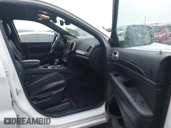 2018 Jeep Grand Cherokee Altitude with VIN 1C4RJFAG4JC320599, listed as a IAAI auction lot 42182661 with 70,957 mi miles and . Bid and sale history available at DreamBid. Image 5.