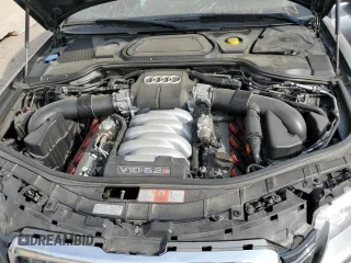 2007 Audi S8 z VIN WAUPN44E97N013501, wystawiony jako Copart lot #74240814 z przebiegiem Nie podano mil oraz Szkoda całkowita • Salvage title. Historia ofert i sprzedaży dostępna na DreamBid. Obrazek 11.