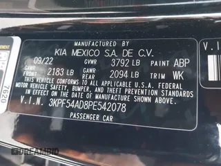 2023 Kia Forte GT-Line z VIN 3KPF54AD8PE542078, wystawiony jako IAAI lot #42113560 z przebiegiem 29 373 mil mil oraz . Historia ofert i sprzedaży dostępna na DreamBid. Obrazek 9.