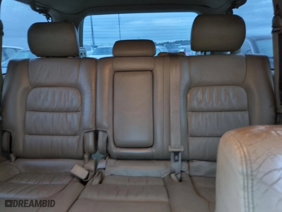 2004 Lexus LX 470 with VIN JTJHT00W243543558, listed as a Copart auction lot 74859974 with 189,556 mi miles and Salvage Title. Bid and sale history available at carsss.com. Image 10.