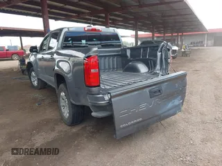 2021 Chevrolet Colorado 4WD LT with VIN 1GCGTCEN1M1107053, listed as a IAAI auction lot 42430796 with 76,128 mi miles and . Bid and sale history available at DreamBid. Image 3.