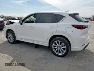 2025 Mazda CX-5 2.5 S Premium Plus Package with VIN JM3KFBEM6S0544933, listed as a Copart auction lot 50345565 with 506 mi miles and Salvage Title. Bid and sale history available at carsss.com. Image 2.