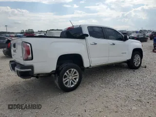 2020 GMC Canyon 2WD SLT z VIN 1GTG5DEN6L1172883, wystawiony jako Copart lot #71844604 z przebiegiem 81 504 mil mil oraz Czysty tytuł • Clean title. Historia ofert i sprzedaży dostępna na DreamBid. Obrazek 3.