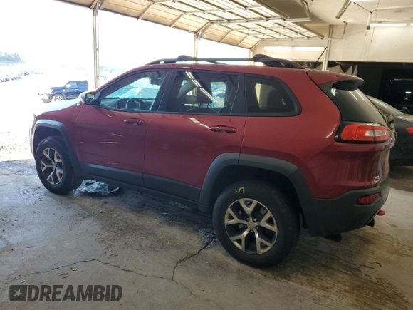 2015 Jeep Cherokee Trailhawk with VIN 1C4PJMBS1FW745928, listed as a Copart auction lot 62032585 with 132,559 mi miles and Salvage title. Bid and sale history available at DreamBid. Image 2.