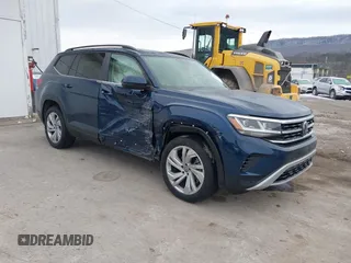 2023 Volkswagen Atlas SE z VIN 1V2KR2CA4PC521423, wystawiony jako IAAI lot #41636423 z przebiegiem 17 128 mil mil oraz . Historia ofert i sprzedaży dostępna na DreamBid. Obrazek 1.