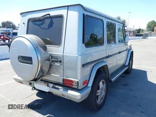 2002 Mercedes-Benz G-Class with VIN WDCYR49E02X129195, listed as a IAAI auction lot 41871996 with 200,945 mi miles. Bid and sale history available at carsss.com. Image 4.