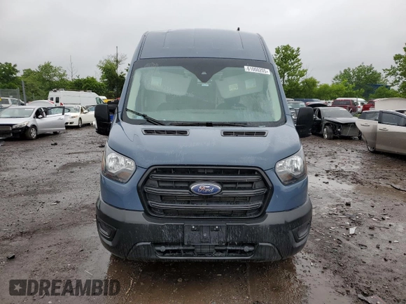 2020 Ford Transit Cargo with VIN 1FTBR3X87LKB26909, listed as a Copart auction lot 61000205 with 27,029 mi miles and Salvage title. Bid and sale history available at DreamBid. Image 5.