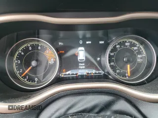 2017 Jeep Cherokee High Altitude z VIN 1C4PJMDSXHW551057, wystawiony jako Copart lot #57811745 z przebiegiem 86 254 mil mil oraz Szkoda całkowita • Salvage title. Historia ofert i sprzedaży dostępna na DreamBid. Obrazek 9.