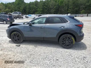 2023 Mazda CX-30 Premium with VIN 3MVDMBDY1PM509621, listed as a Copart auction lot 58316715 with 27,979 mi miles and Salvage title. Bid and sale history available at DreamBid. Image 2.