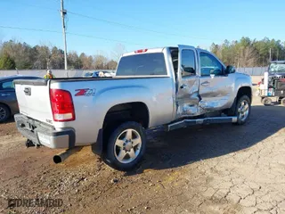 2013 GMC Sierra 2500HD SLT with VIN 1GT121C82DF218580, listed as a IAAI auction lot 41758693 with 121,798 mi miles. Bid and sale history available at carsss.com. Image 4.
