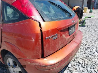 2005 Ford Focus S with VIN 3FAFP37N85R113281, listed as a IAAI auction lot 42037187 with Not Provided miles and . Bid and sale history available at carsss.com. Image 12.
