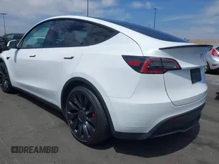 2022 Tesla Model Y Performance with VIN 7SAYGDEF8NF407109, listed as a IAAI auction lot 42014282 with 24,937 mi miles and . Bid and sale history available at DreamBid. Image 3.