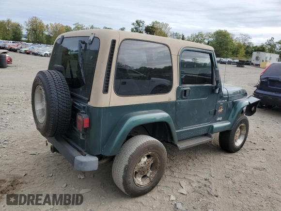 2000 Jeep Wrangler Sahara with VIN 1J4FA59S1YP747919, listed as a Copart auction lot 72278044 with 157,360 mi miles and Salvage Title. Bid and sale history available at carsss.com. Image 3.