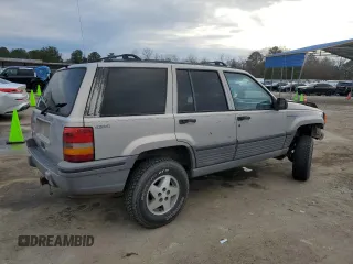 1995 Jeep Grand Cherokee Laredo with VIN 1J4GZ58S7SC517783, listed as a Copart auction lot 43057145 with 225,273 mi miles and Salvage Title. Bid and sale history available at carsss.com. Image 3.