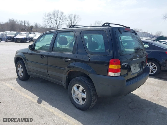 2003 Ford Escape XLS Popular with VIN 1FMYU02153KB46301, listed as a IAAI auction lot 41793418 with 188,184 mi miles. Bid and sale history available at carsss.com. Image 3.